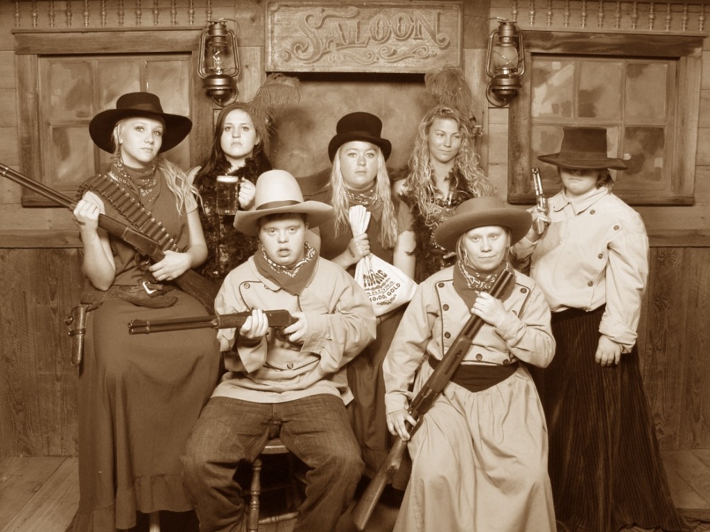 After we had been at the amusement park for a while, we ran into Katie Kirkham, Alex Crandall, Haley Crystal and Rylee Dick. They asked Jack, Annie and Autumn if they wanted to go on rides with them. Boy, did they ever! Then we went to Pioneer Village and got pictures. Autumn's favorite TV show is Bonanza and she says that she is Little Joe (the character that was played by Michael Landon). There was no way she was going to let this picture happen without guns!