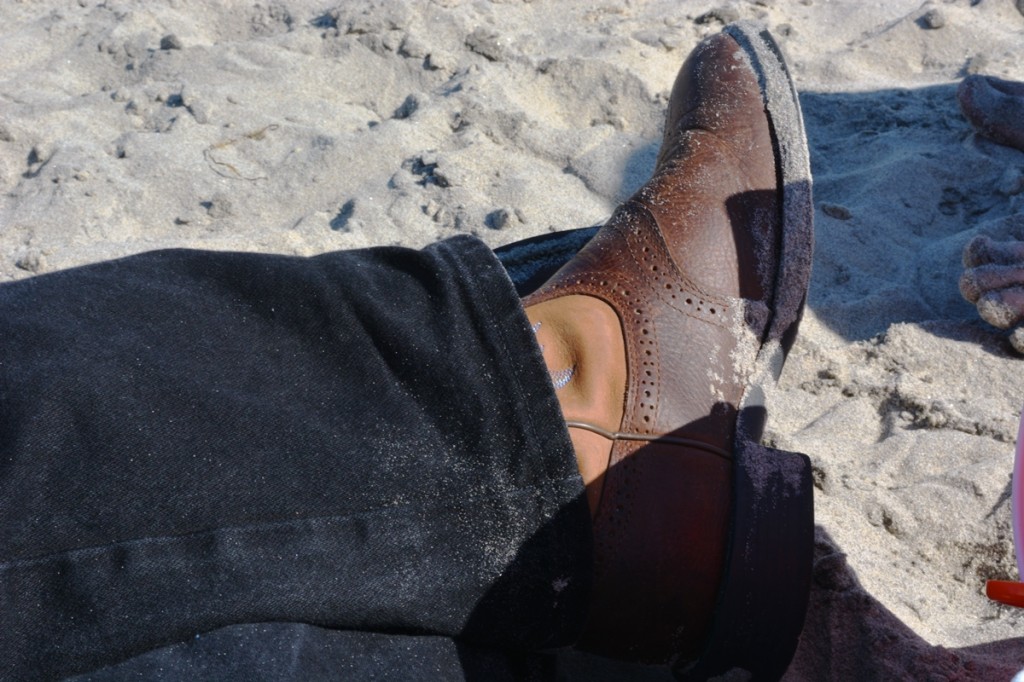 John M Simmons on the beach