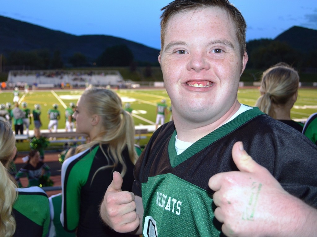 Jack Simmons watching the high school football game