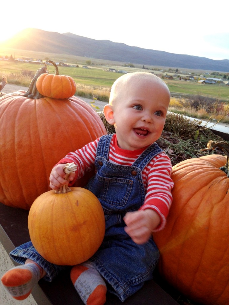 James Simmons smiling with pumpkins
