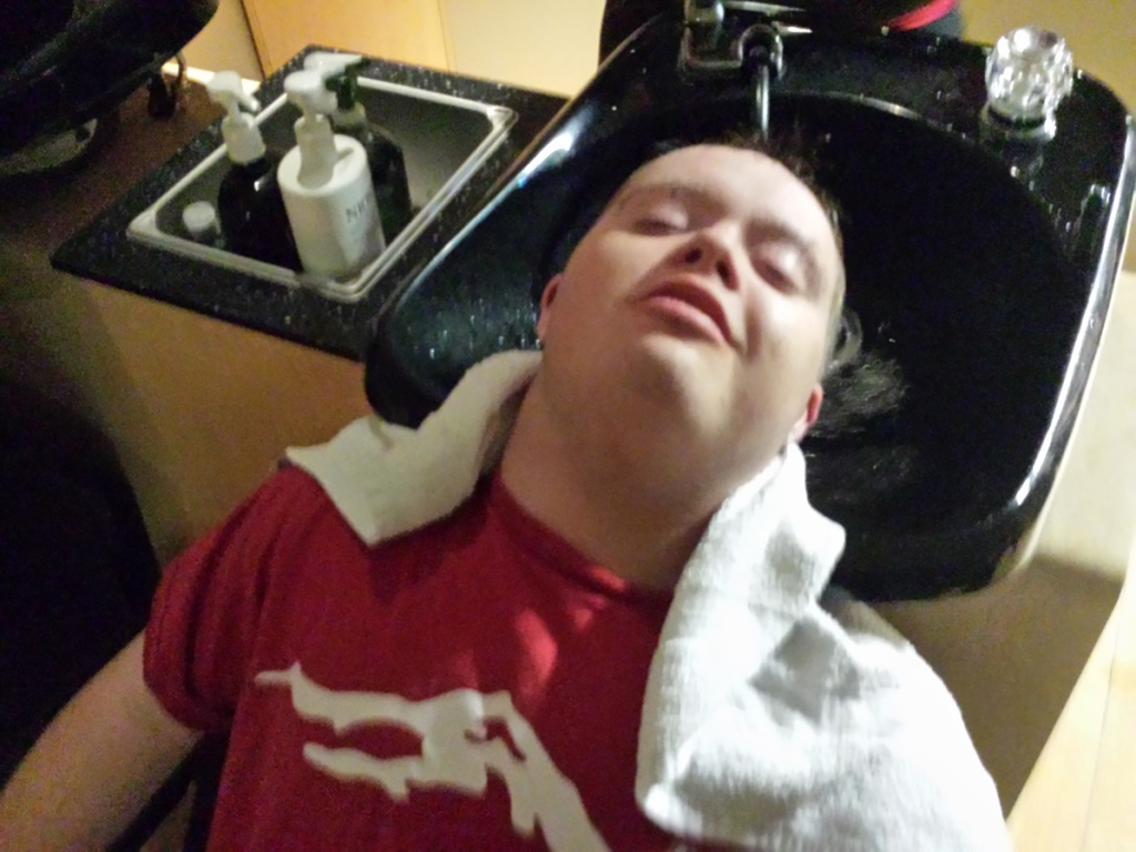 Jack Simmons getting hair washed